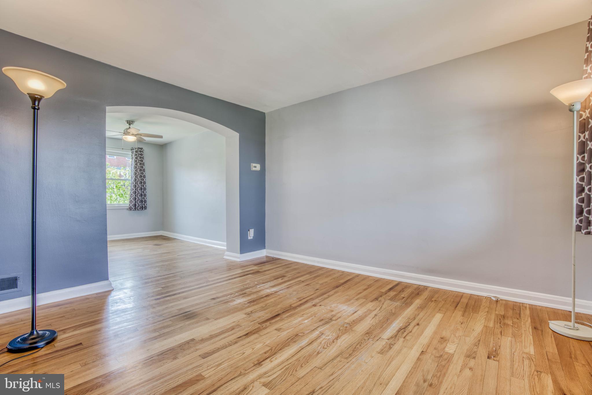 Living room with wood floors.