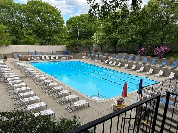 a view of a balcony with chairs