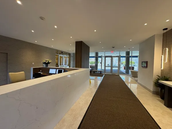 a view of a living room and a lots of furniture
