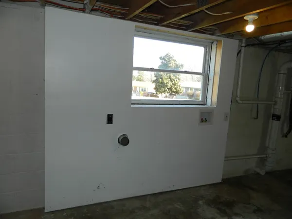 a view of a window in an empty room