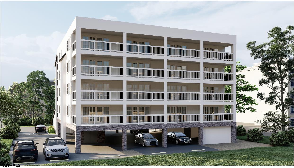 321 6th Street South, Unit 8 Brigantine, NJ 08203 - Photo 3 of 8 a front view of a building with windows