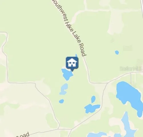 a bathroom with a sink mirror and vanity