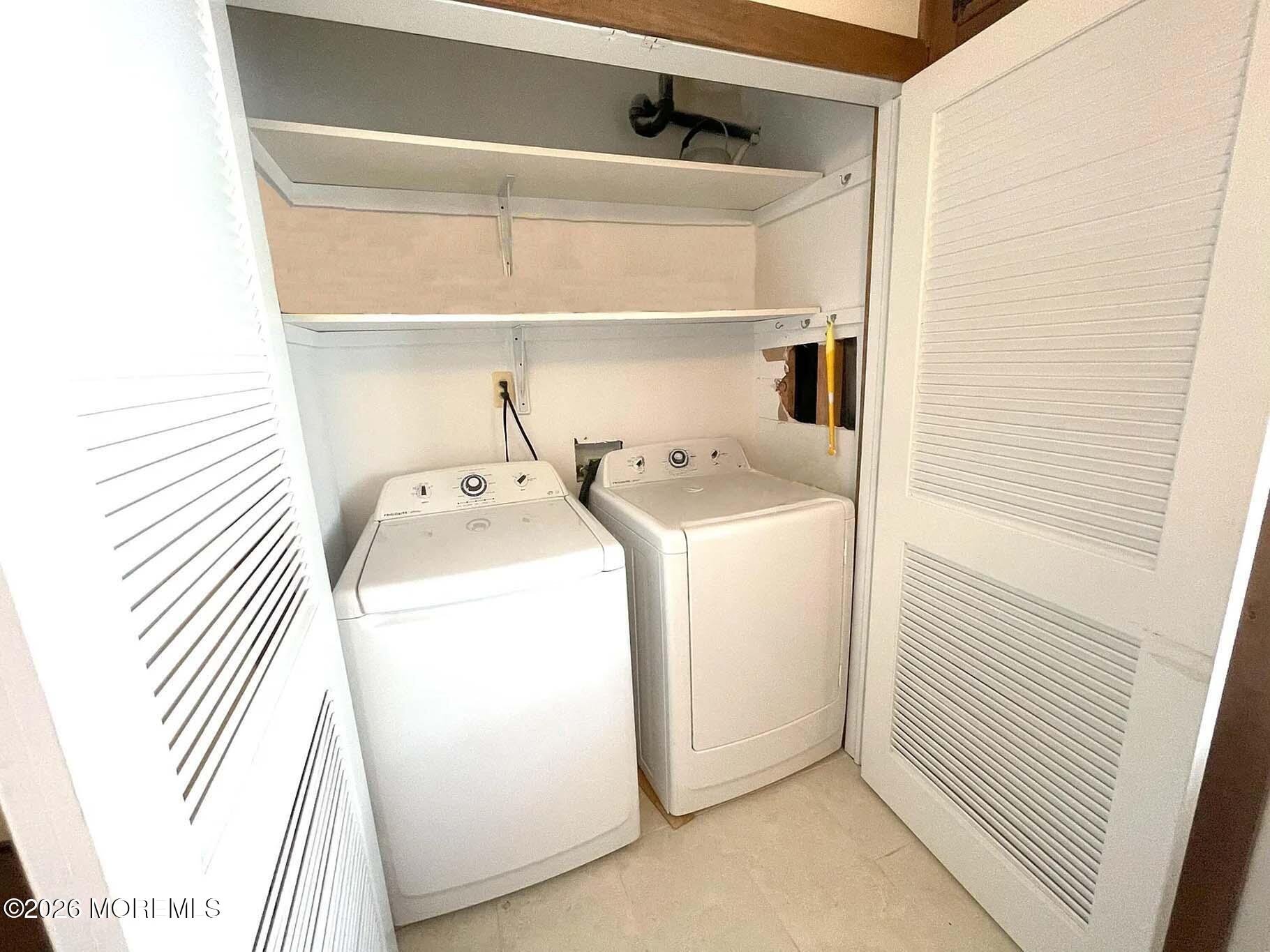 207 Bay Boulevard Lavallette, NJ 08735 - Photo 19 of 62 a utility room with dryer and washer