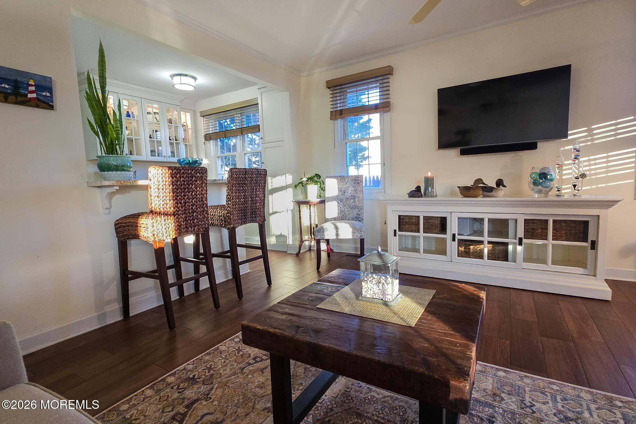 207 Bay Boulevard Lavallette, NJ 08735 - Photo 29 of 62 a view of a dining room with furniture and wooden floor