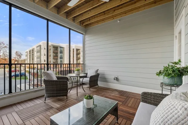 a view of a chairs and table on the deck