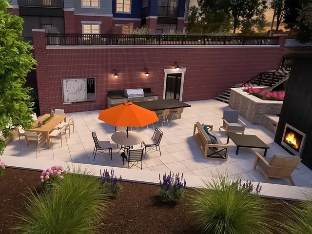 an aerial view of a house with a swimming pool