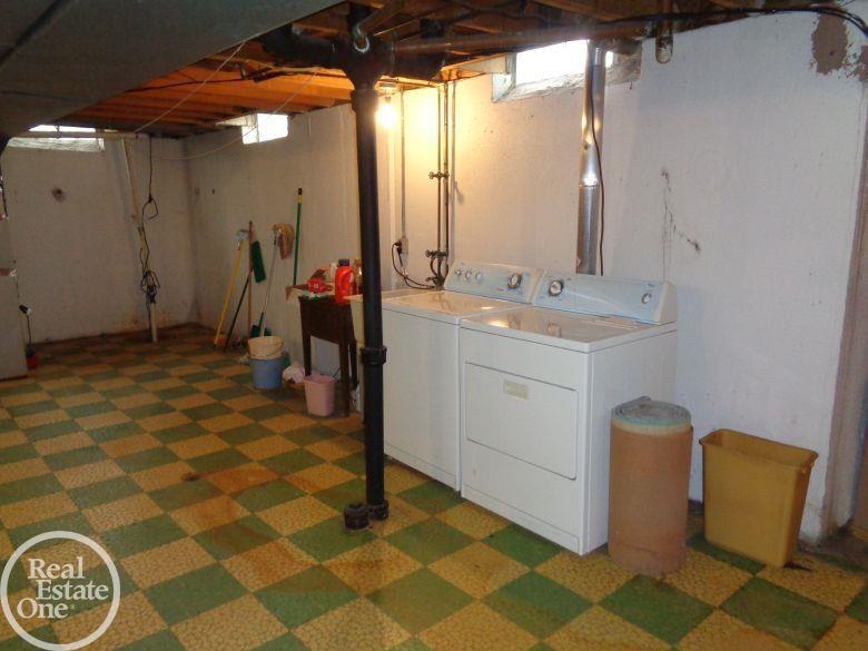 13033 Plumbrook Road Sterling Heights, MI 48312 - Photo 18 of 24 Basement Laundry Area