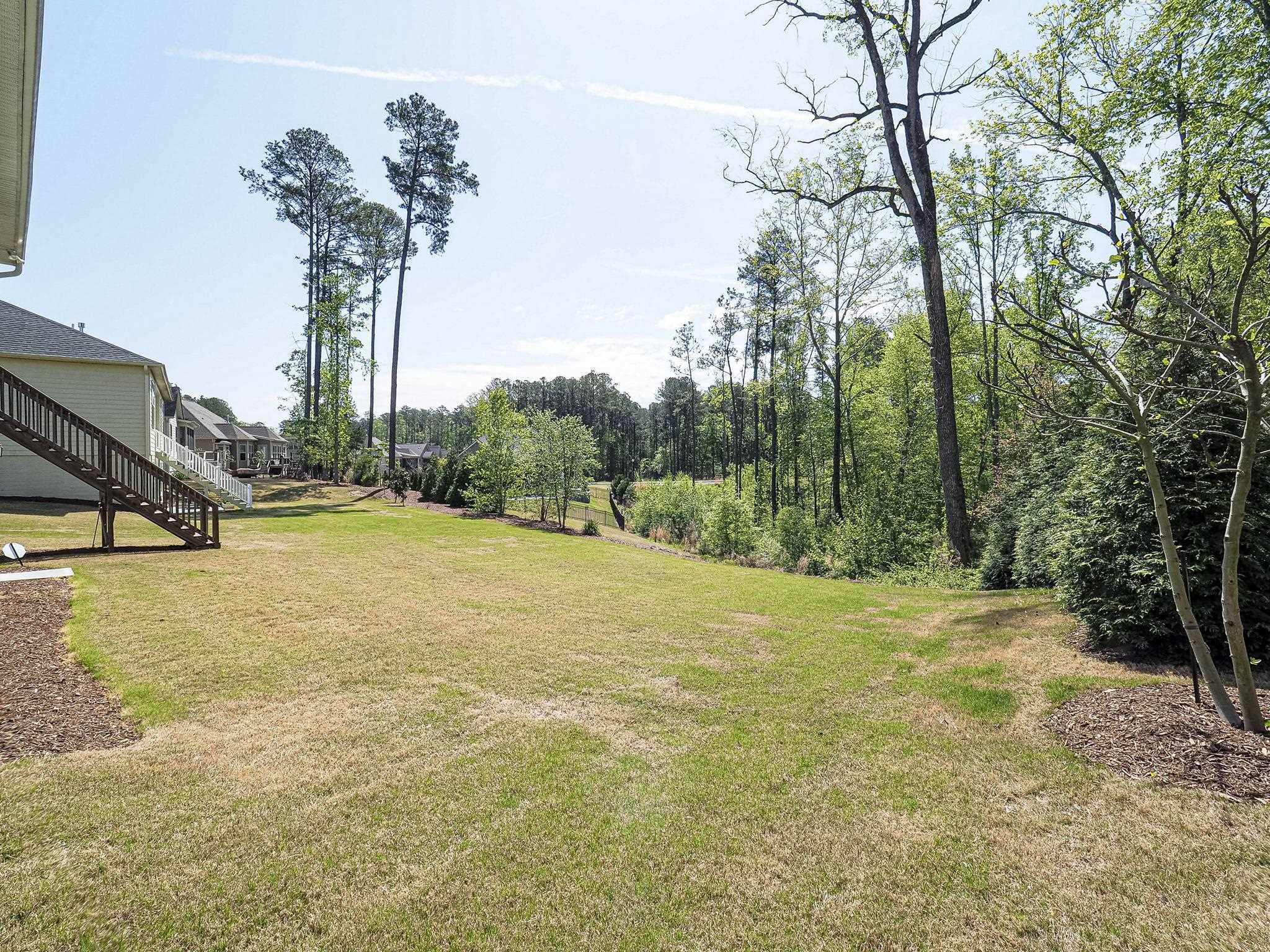 2619 Beckwith Road Apex, NC 27523 - Photo 27 of 46 A blank slate to create your own oasis, garden, or pet paradise. Great backyard with wooded buffer