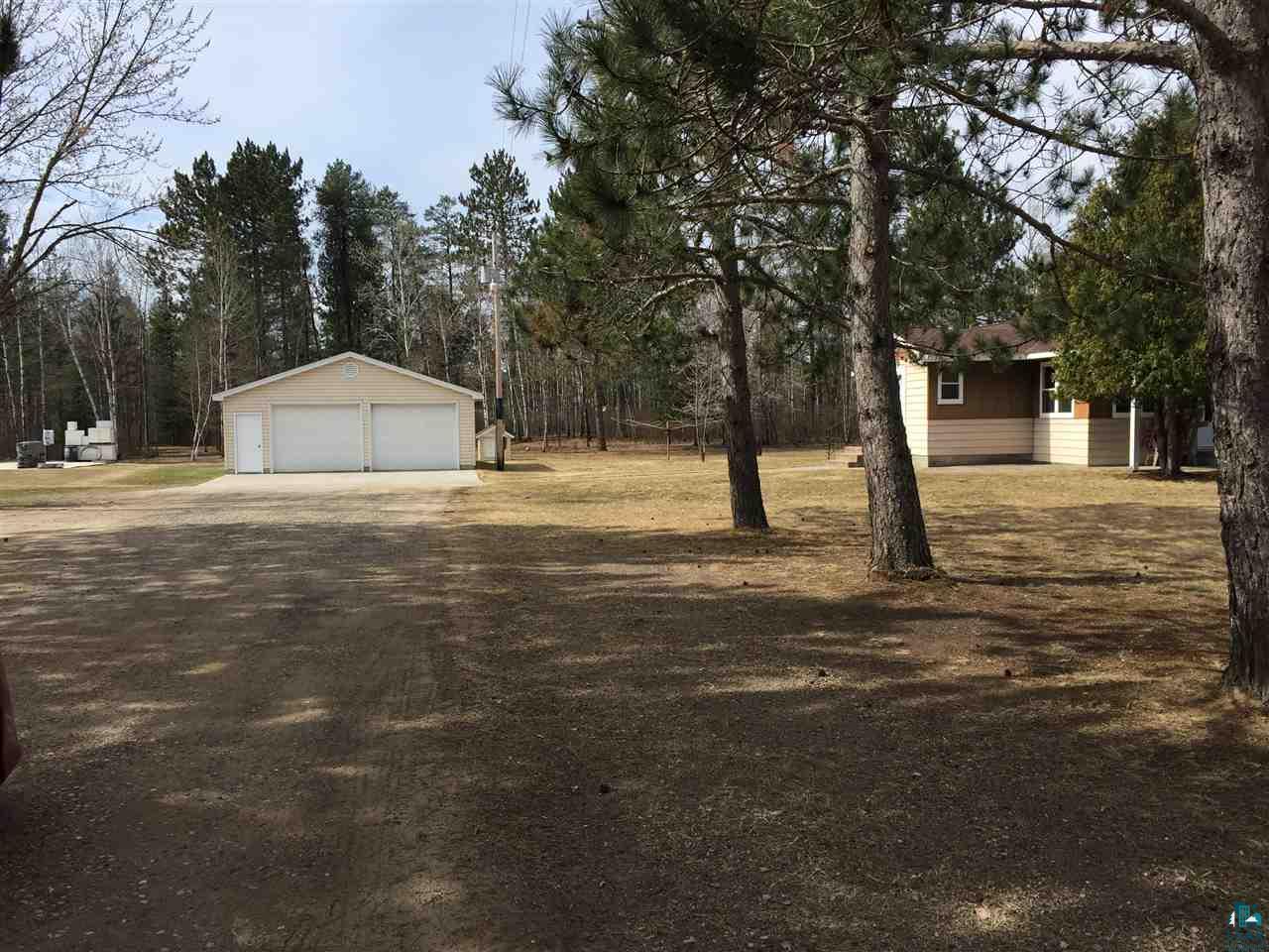 4473 Vermilion Trail Gilbert, MN 55741 - Photo 17 of 21 sweeping yard