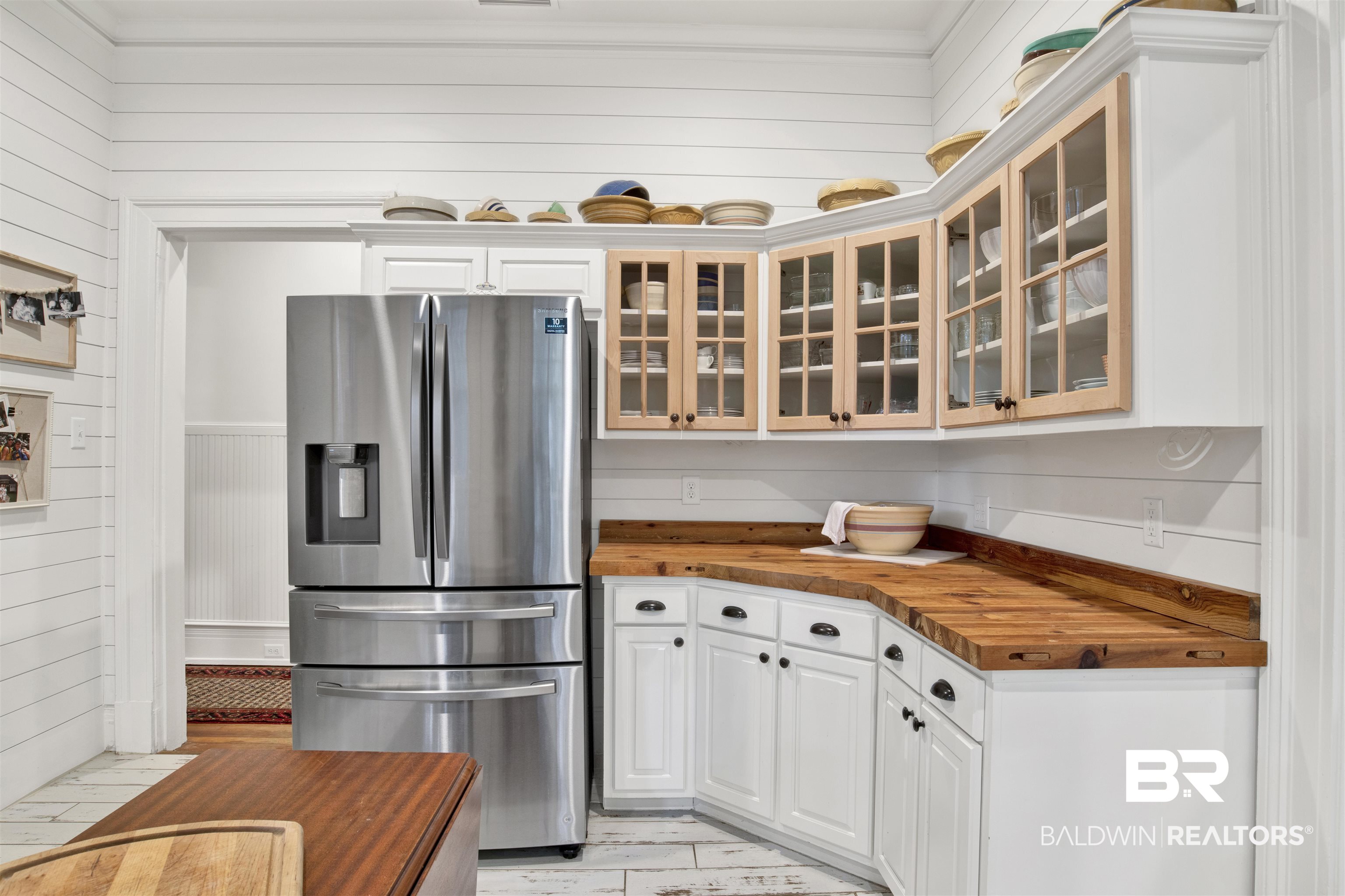 1654 Government Street Mobile, AL 36604 - Photo 30 of 45 Kitchen featuring wooden counters, white cabinetry, and stainless steel fridge with ice dispenser