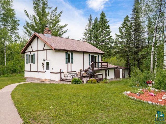 3616 Lavaque Road Hermantown, MN 55811 - Photo 23 of 43 Tudor-style residence with white exterior siding and dark wood trim accents