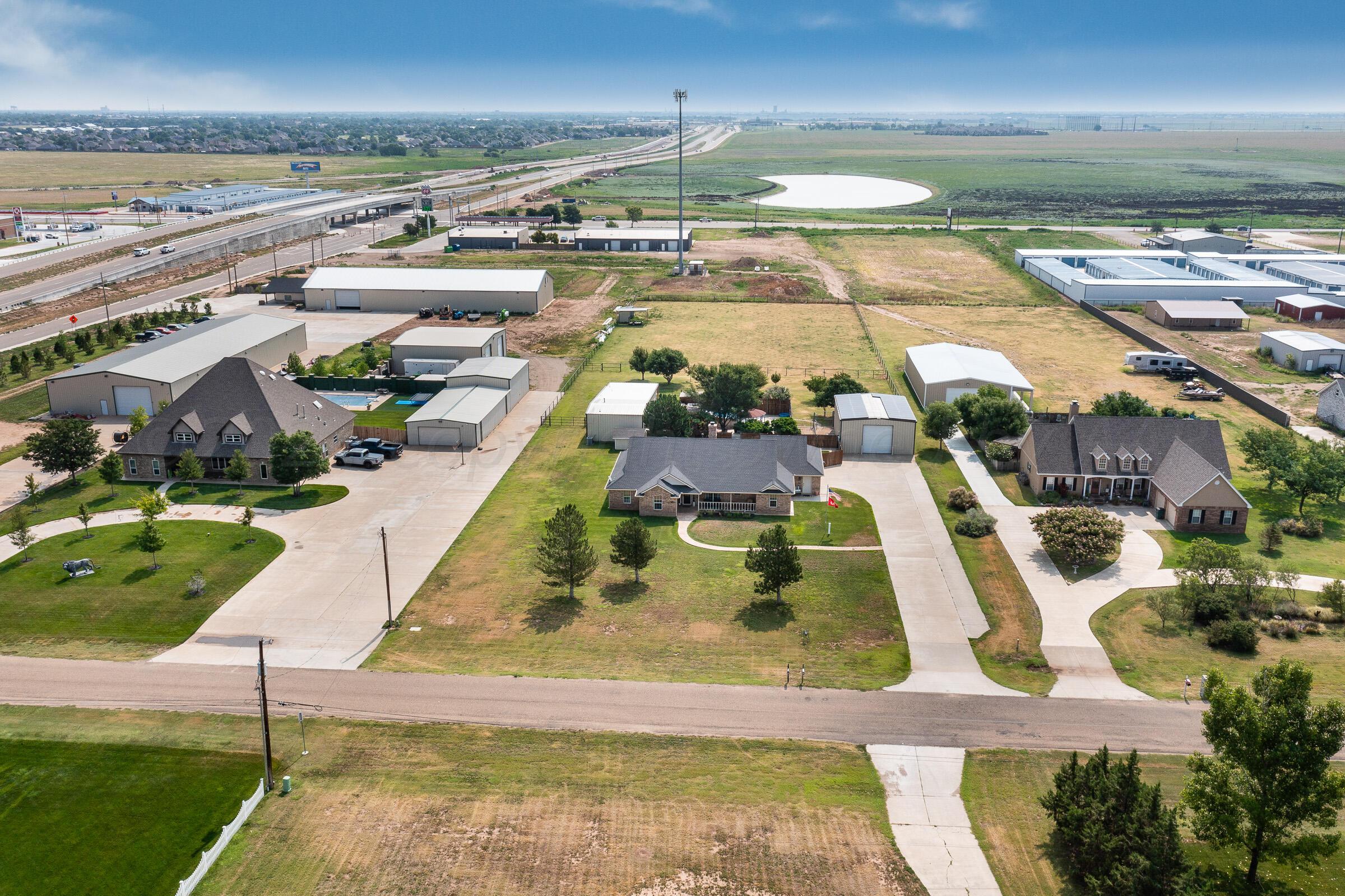 8921 Greyhawk Road Amarillo, TX 79119 - Photo 24 of 56 swimming pool view with sitting space
