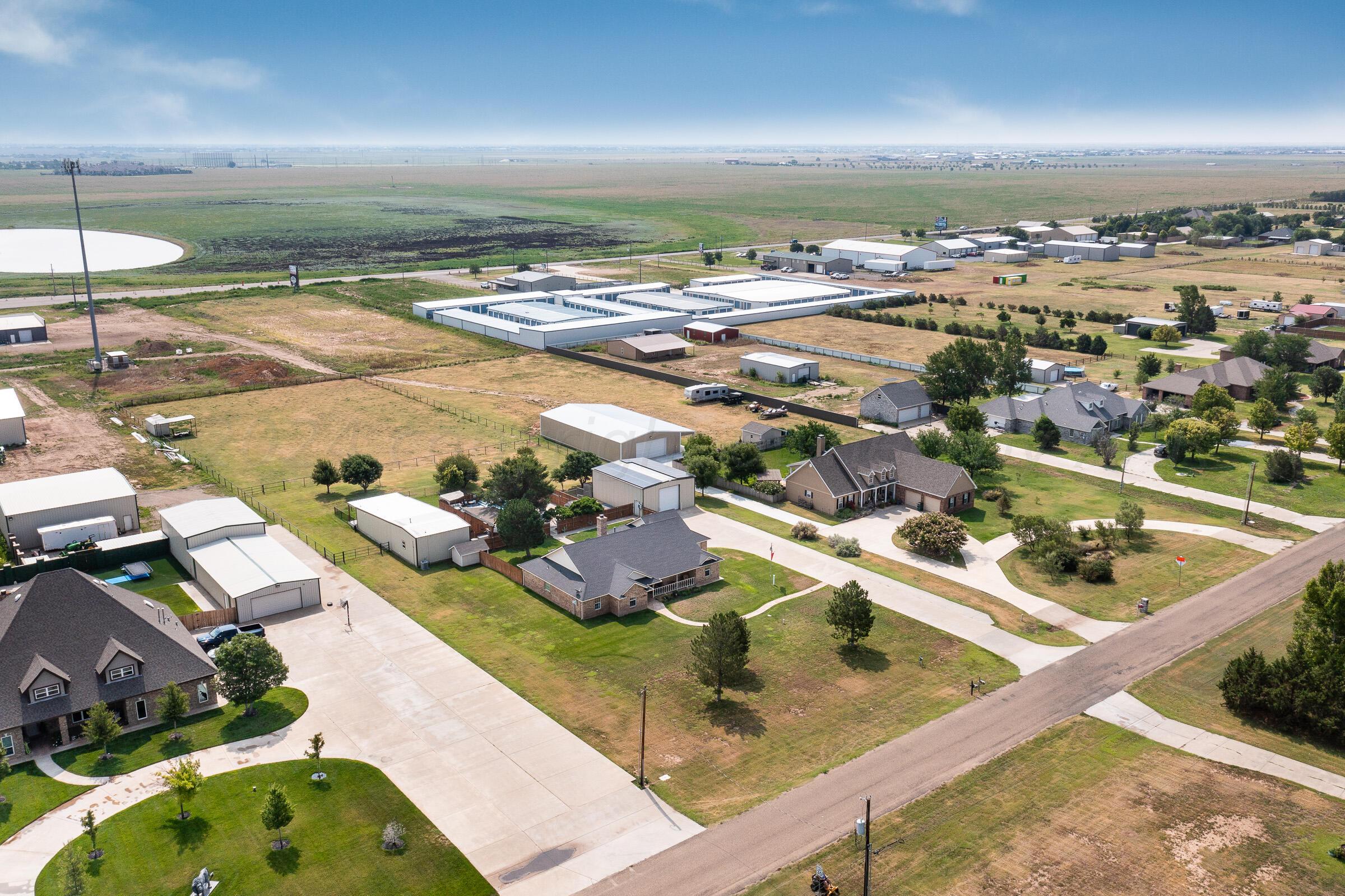 8921 Greyhawk Road Amarillo, TX 79119 - Photo 25 of 56 an view of a swimming pool and an ocean