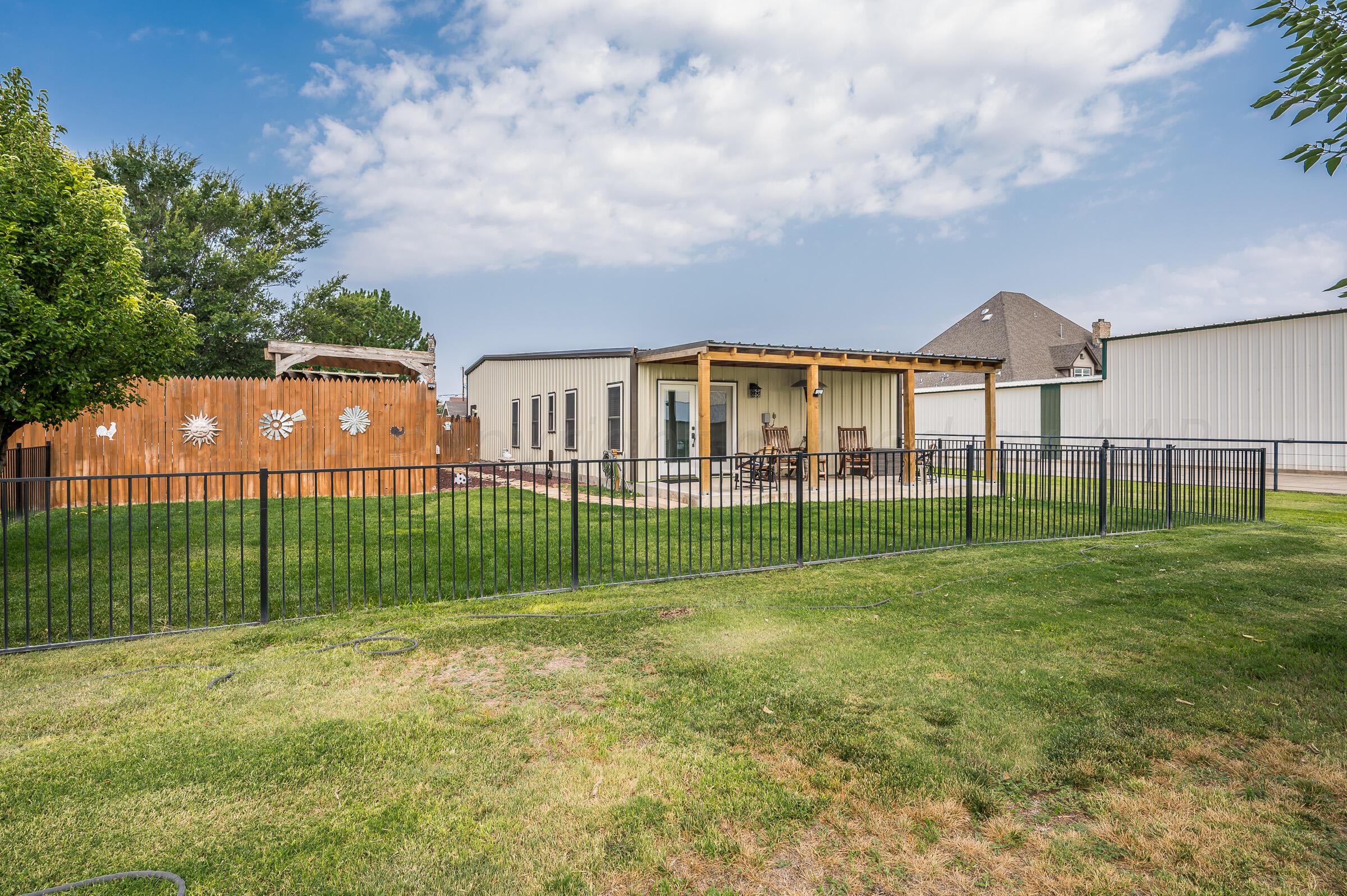 8921 Greyhawk Road Amarillo, TX 79119 - Photo 29 of 56 a view of a park in front of a house