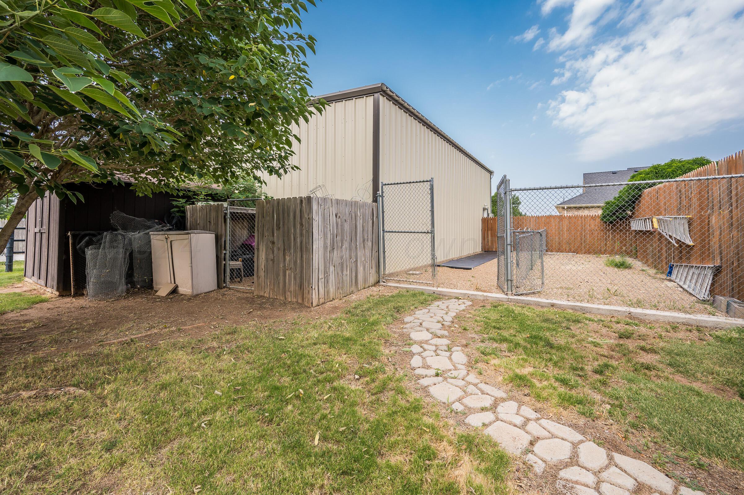 8921 Greyhawk Road Amarillo, TX 79119 - Photo 53 of 56 a view of backyard of house