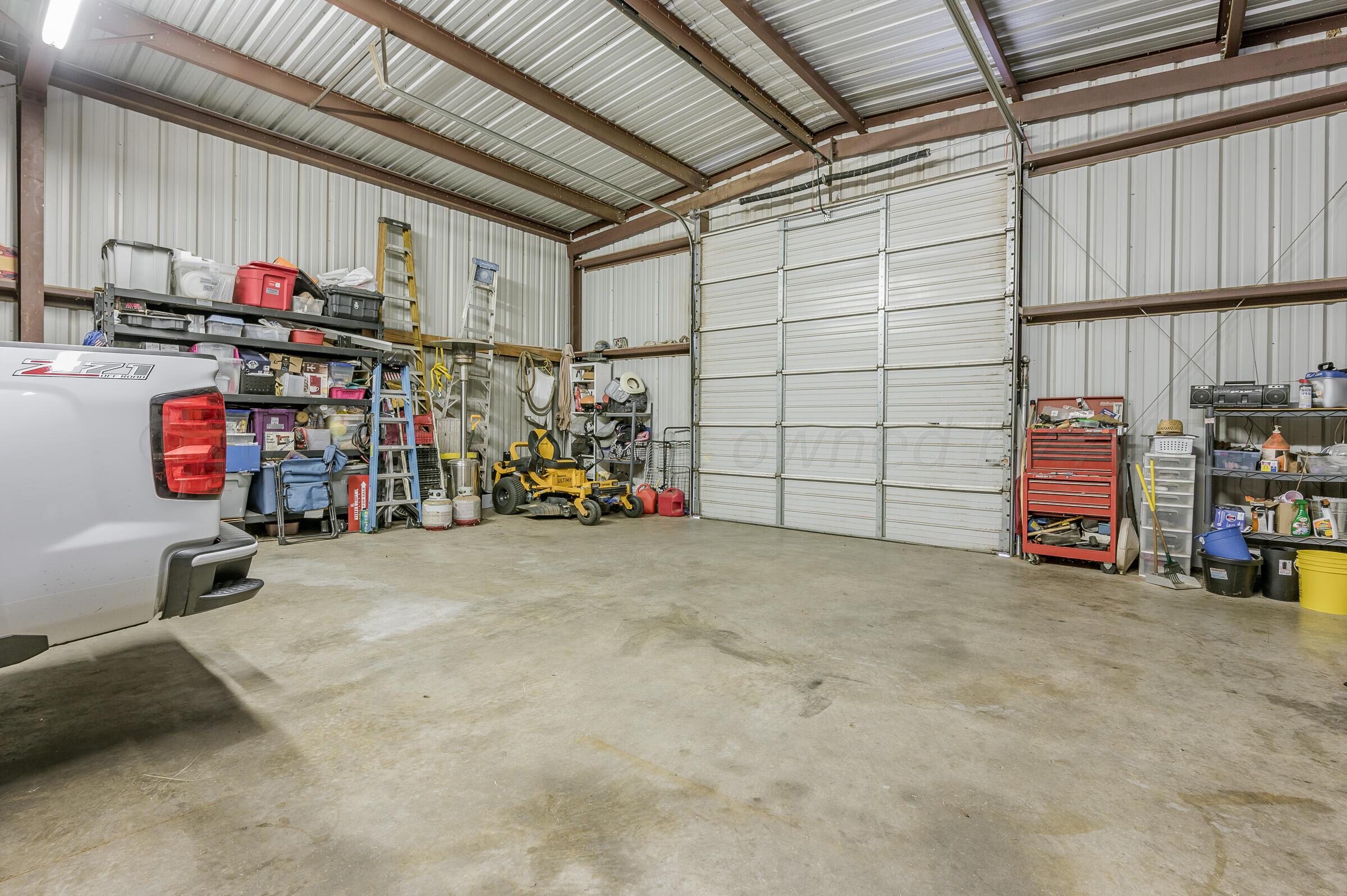 8921 Greyhawk Road Amarillo, TX 79119 - Photo 56 of 56 a view of storage and utility room