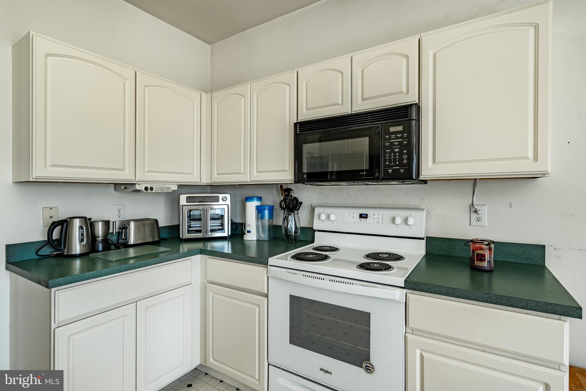 44 Ryhill Drive Dover, DE 19904 - Photo 12 of 53 a kitchen with cabinets appliances a sink and a counter space