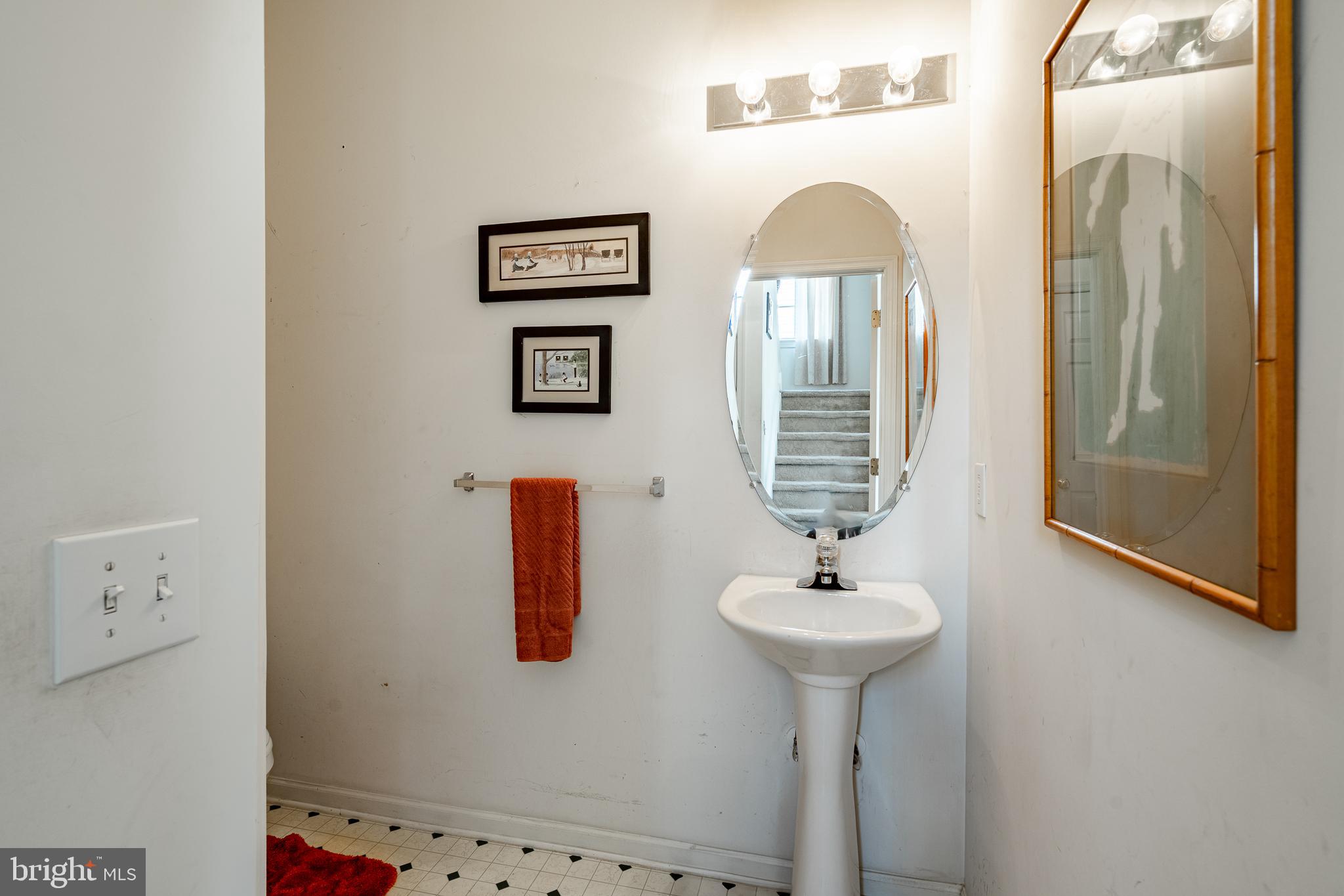 44 Ryhill Drive Dover, DE 19904 - Photo 19 of 53 a bathroom with a sink and a mirror