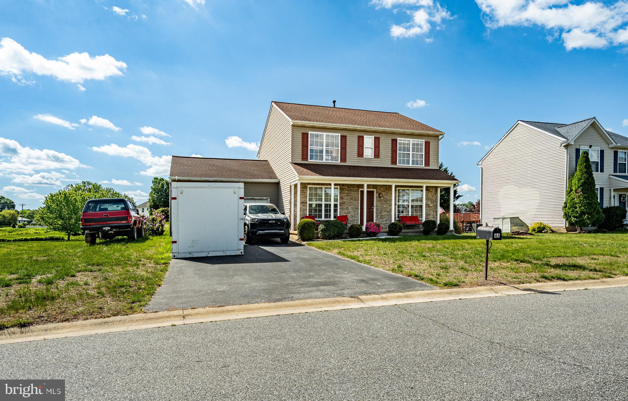 44 Ryhill Drive Dover, DE 19904 - Photo 2 of 53 a view of a house with a yard and garage