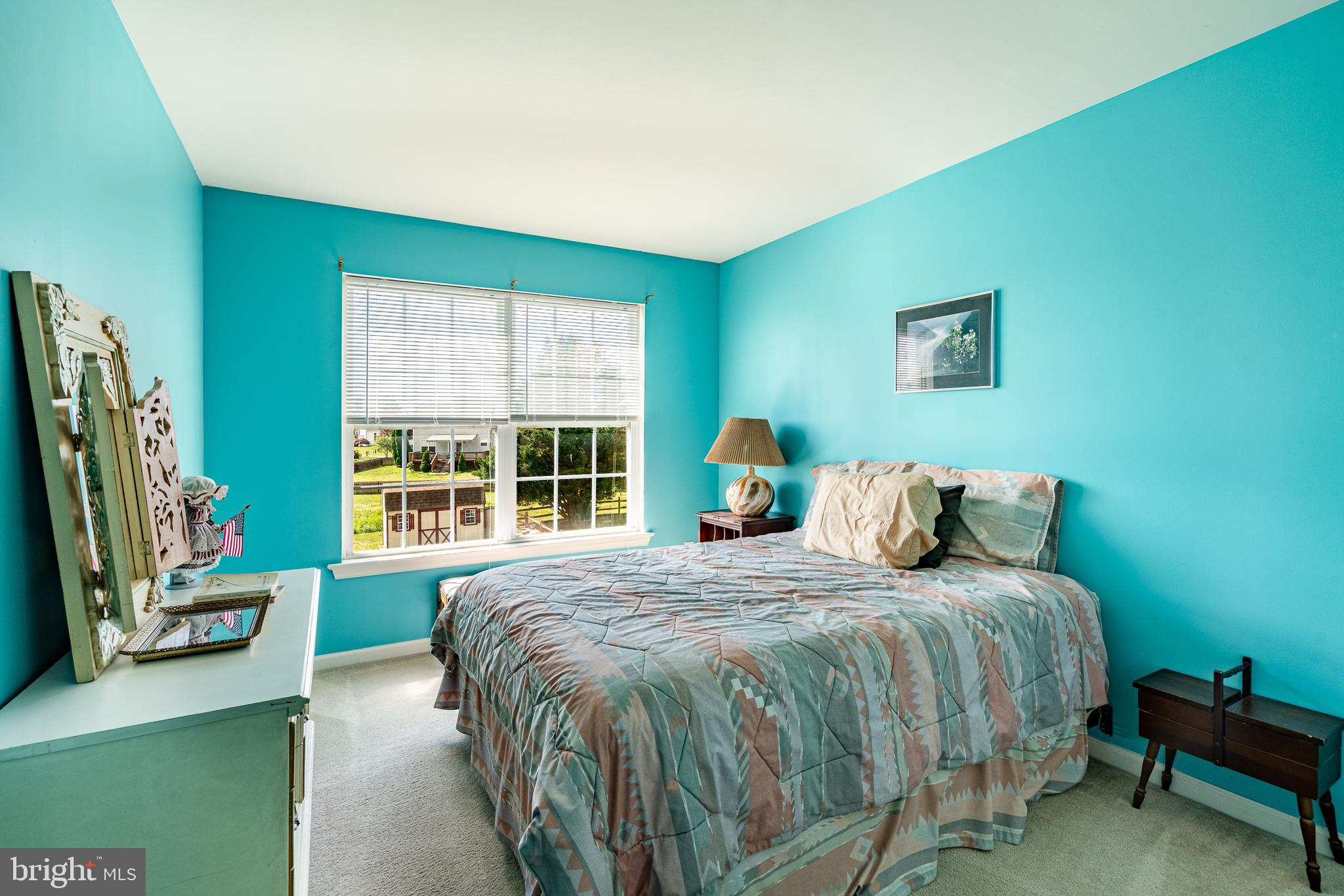 44 Ryhill Drive Dover, DE 19904 - Photo 21 of 53 a bedroom with a bed a window and a flat screen television