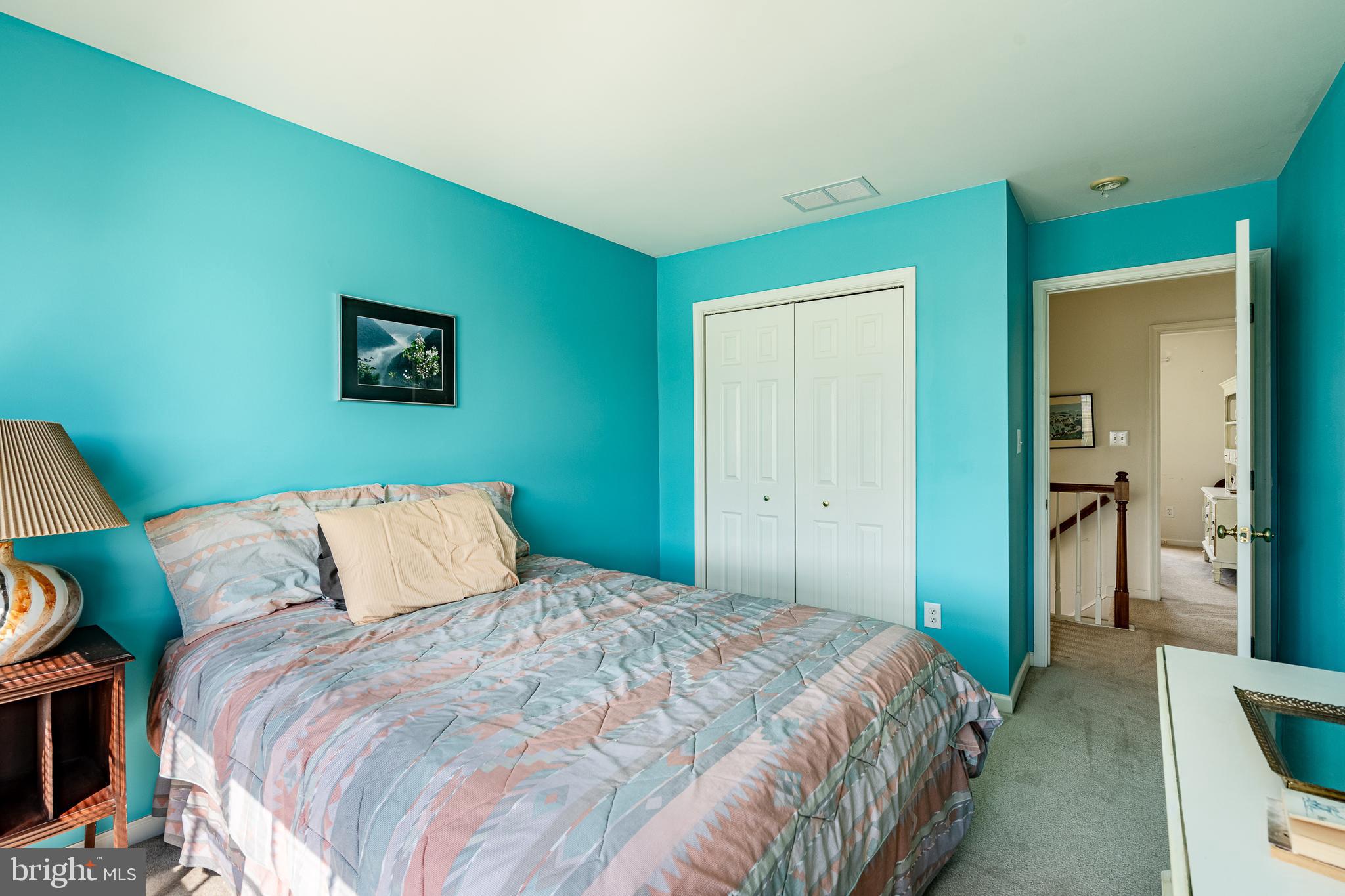 44 Ryhill Drive Dover, DE 19904 - Photo 22 of 53 a bedroom with a bed and a painting on the wall