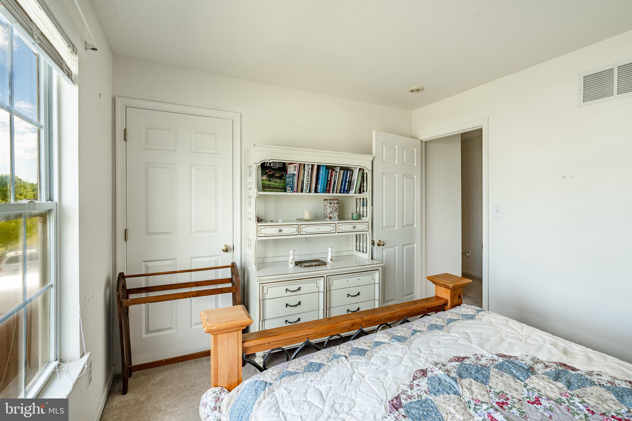 44 Ryhill Drive Dover, DE 19904 - Photo 24 of 53 a bedroom with a bed and a cabinets