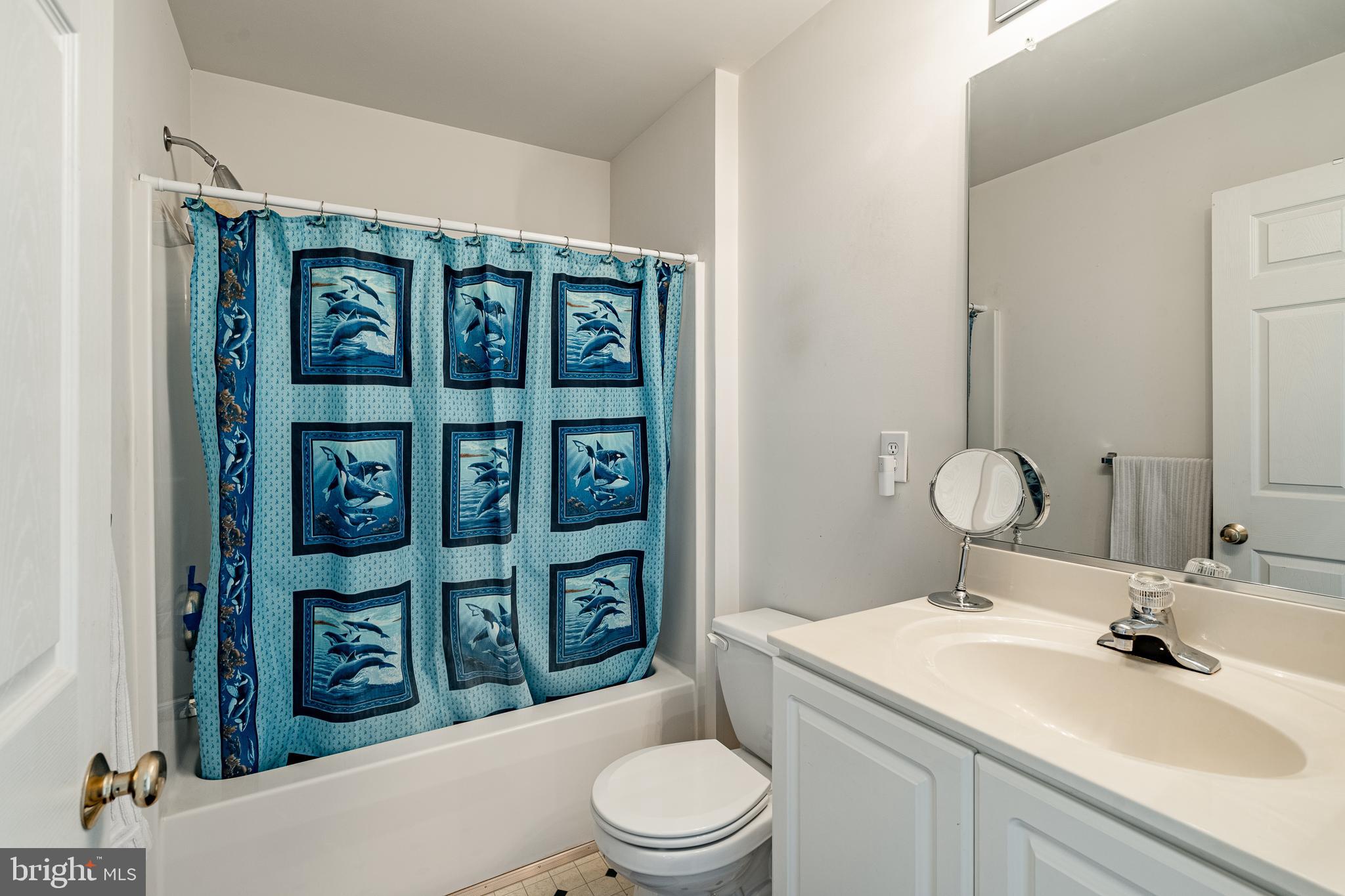44 Ryhill Drive Dover, DE 19904 - Photo 25 of 53 a bathroom with a toilet a sink and a large mirror