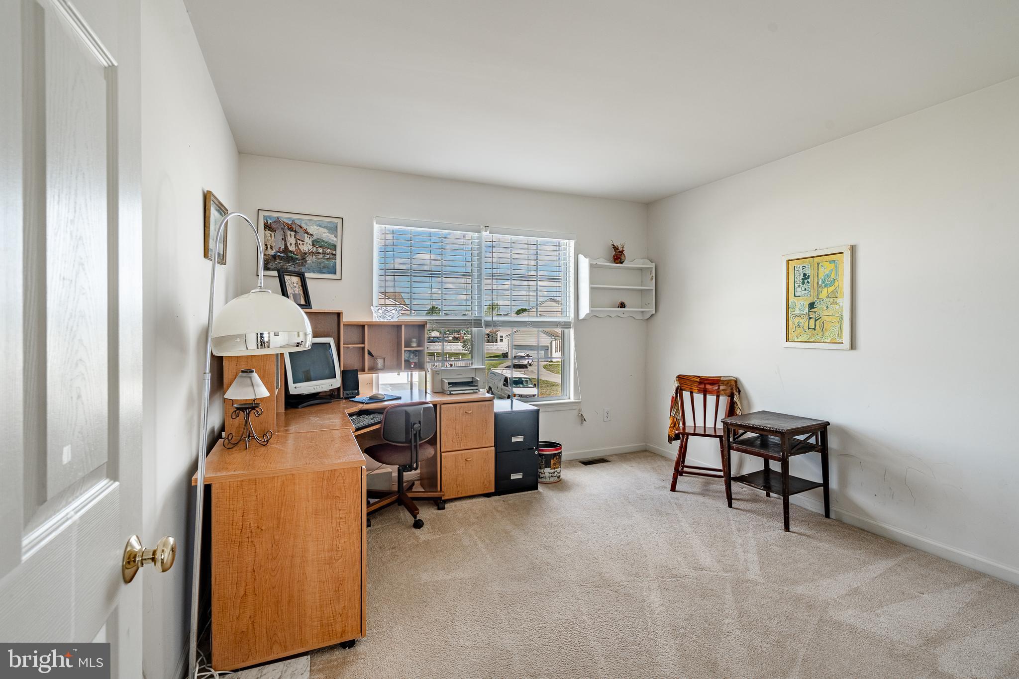 44 Ryhill Drive Dover, DE 19904 - Photo 27 of 53 a view of a workspace with furniture and a window