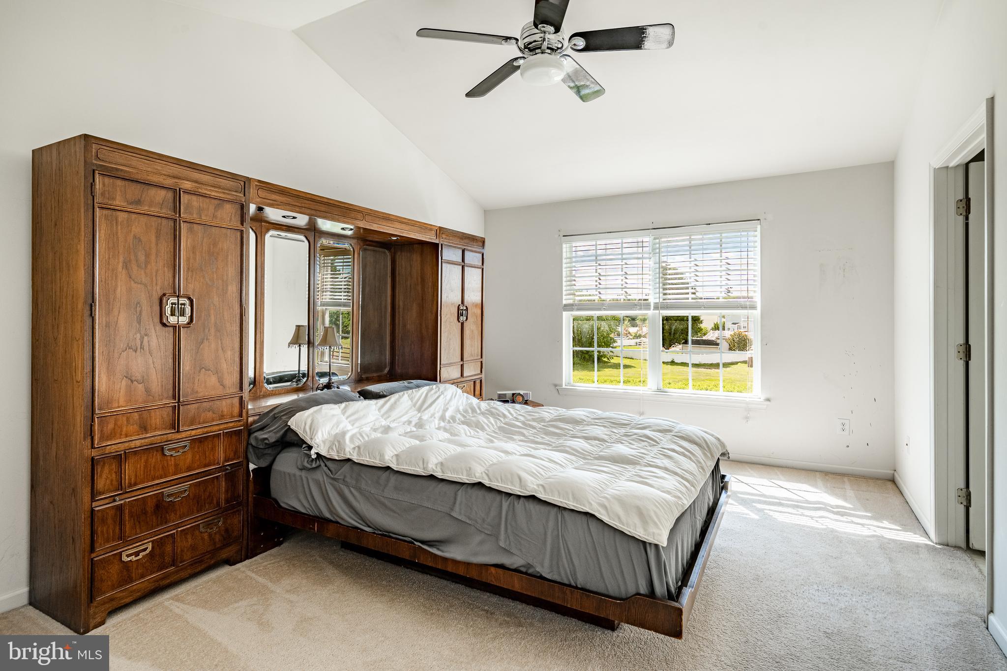 44 Ryhill Drive Dover, DE 19904 - Photo 29 of 53 a bed sitting in a spacious bedroom next to a window