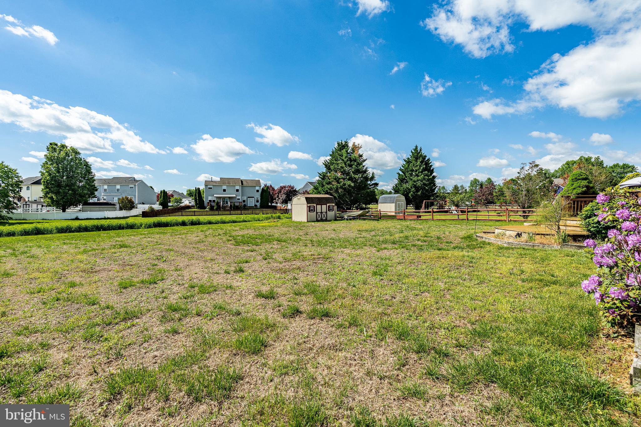 44 Ryhill Drive Dover, DE 19904 - Photo 34 of 53 a backyard of a house with a yard and outdoor seating