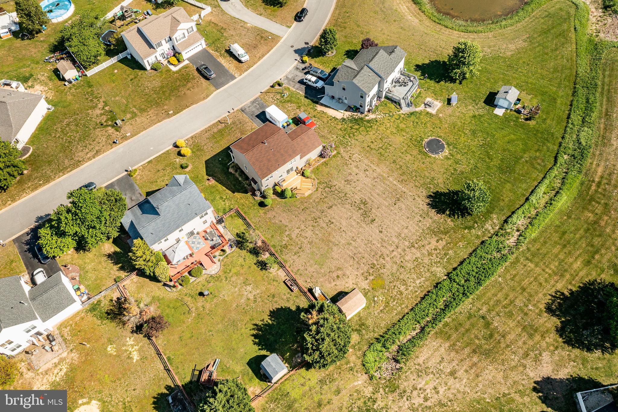 44 Ryhill Drive Dover, DE 19904 - Photo 47 of 53 a bathroom with a sink mirror and vanity