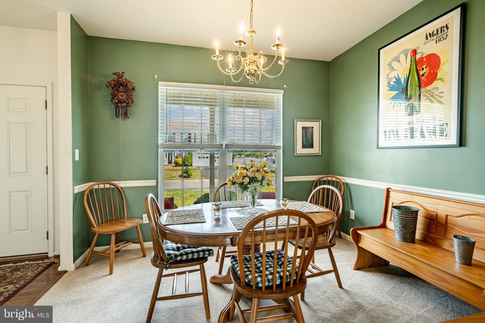 44 Ryhill Drive Dover, DE 19904 - Photo 10 of 53 a view of a dining room with furniture wooden floor and a chandelier