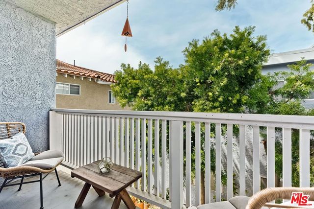a balcony with a bench