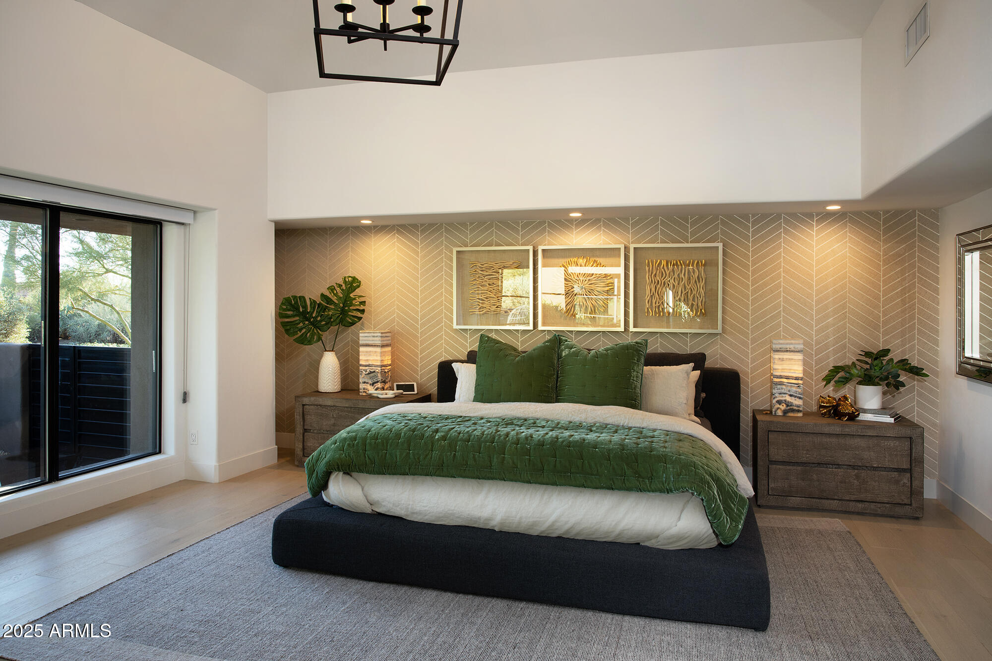 10040 East Happy Valley Road, Unit 626 Scottsdale, AZ 85255 - Photo 17 of 30 a spacious bedroom with a balcony a bed and a couch