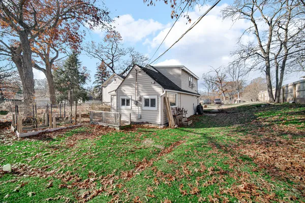 a view of a backyard of the house