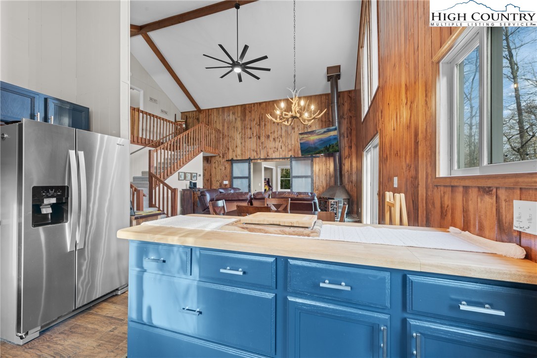101 Pond Creek Road Banner Elk, NC 28604 - Photo 15 of 35 a bathroom with a sink a mirror and a shower