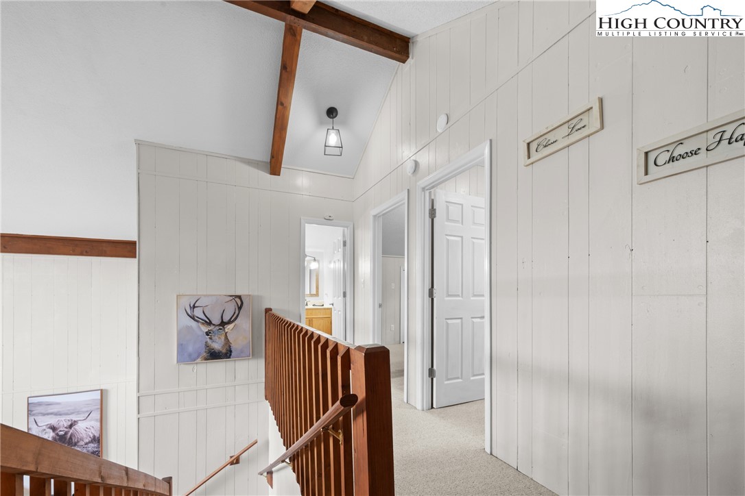 101 Pond Creek Road Banner Elk, NC 28604 - Photo 19 of 35 a view of a hallway with windows