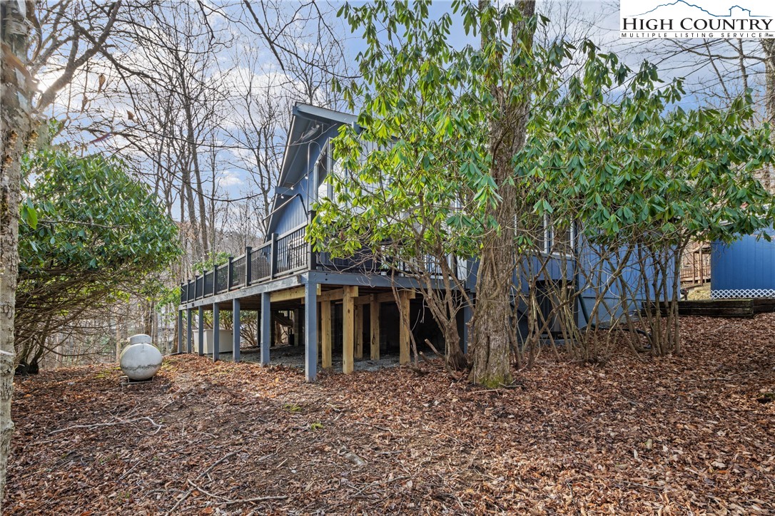 101 Pond Creek Road Banner Elk, NC 28604 - Photo 34 of 35 a view of a house with a yard