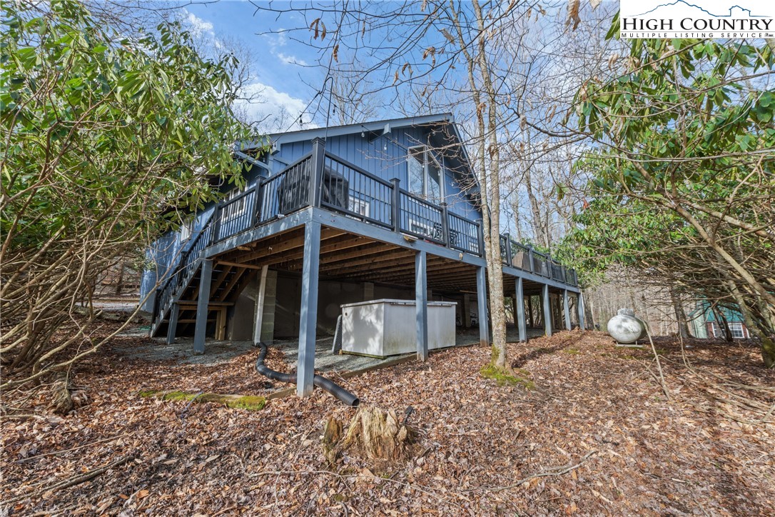 101 Pond Creek Road Banner Elk, NC 28604 - Photo 35 of 35 a house with trees in front of it