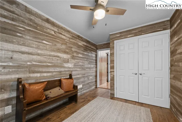 a living room with furniture a window and a fireplace