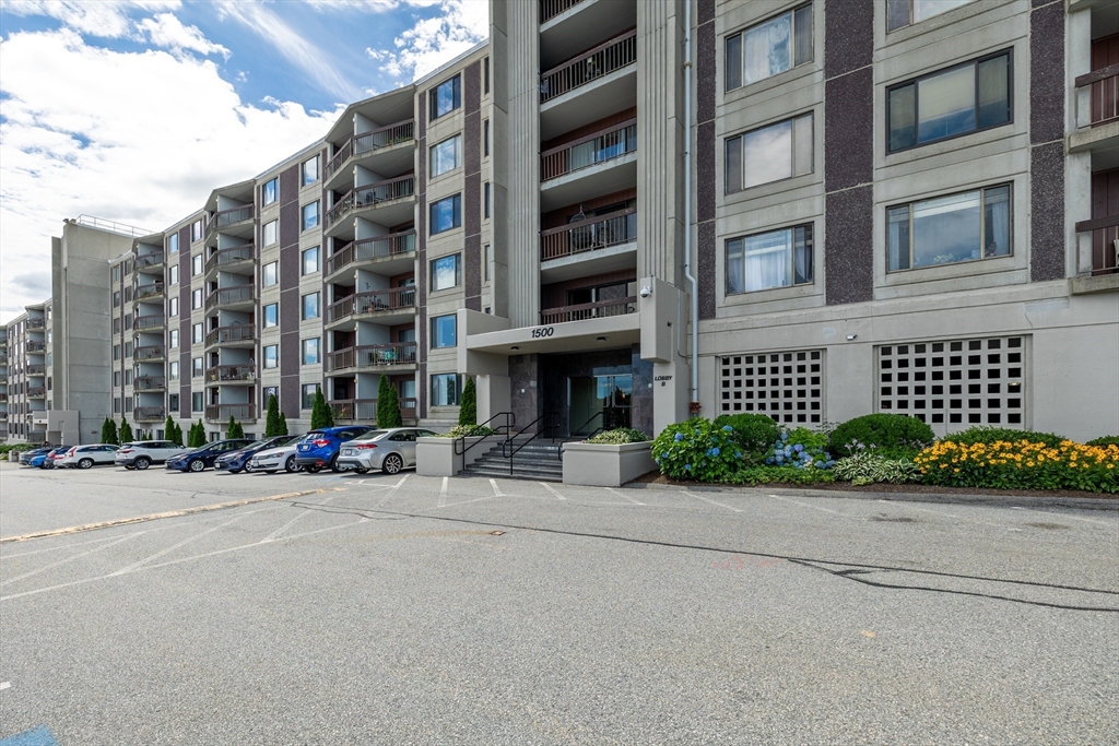 1500 Worcester Road, Unit 217 Framingham, MA 01702 - Photo 2 of 37 a view of a building with a street