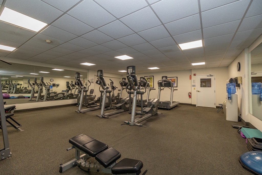 1500 Worcester Road, Unit 217 Framingham, MA 01702 - Photo 26 of 37 a view of a room with gym equipment