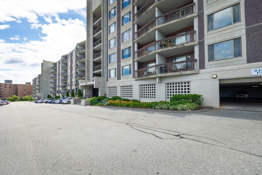 1500 Worcester Road, Unit 217 Framingham, MA 01702 - Photo 3 of 37 front view of a building with a street