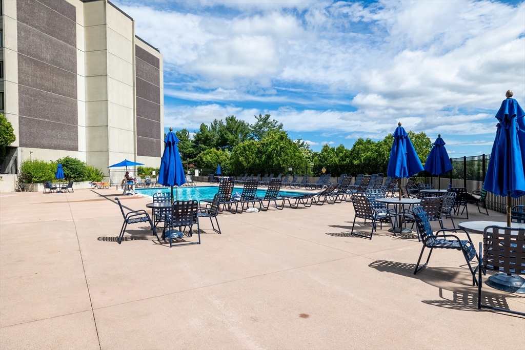 1500 Worcester Road, Unit 217 Framingham, MA 01702 - Photo 35 of 37 a view of outdoor space with chairs