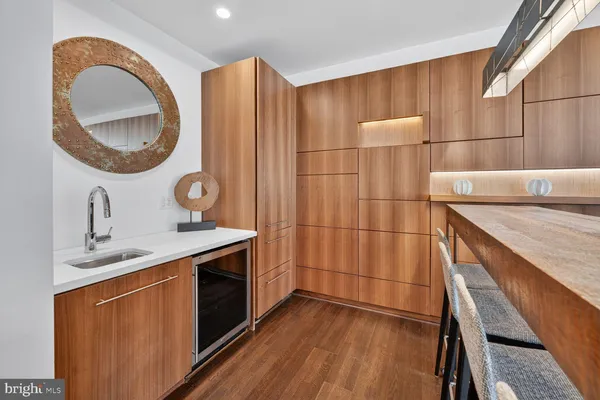 a kitchen with a sink and a stove