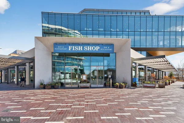 a view of a building with a street