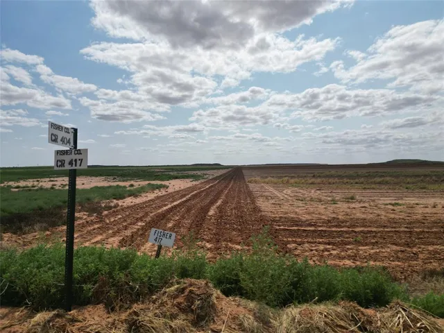 a view of a ocean with a mountain