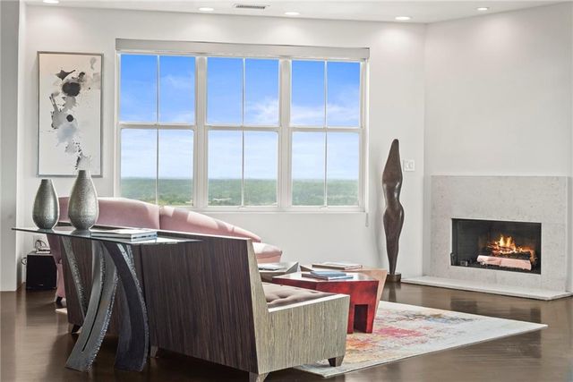 a kitchen view of a stove and a microwave
