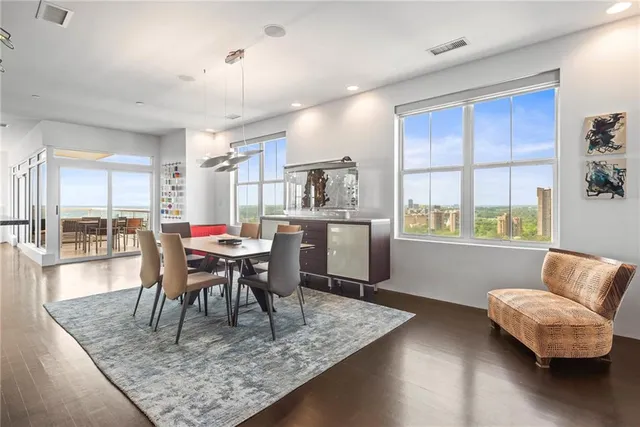 a view of a city with tall buildings in the background