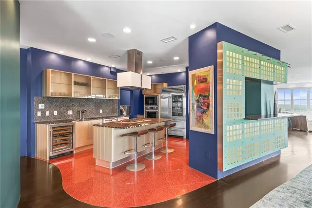 a view of a balcony with chair and floor to ceiling window